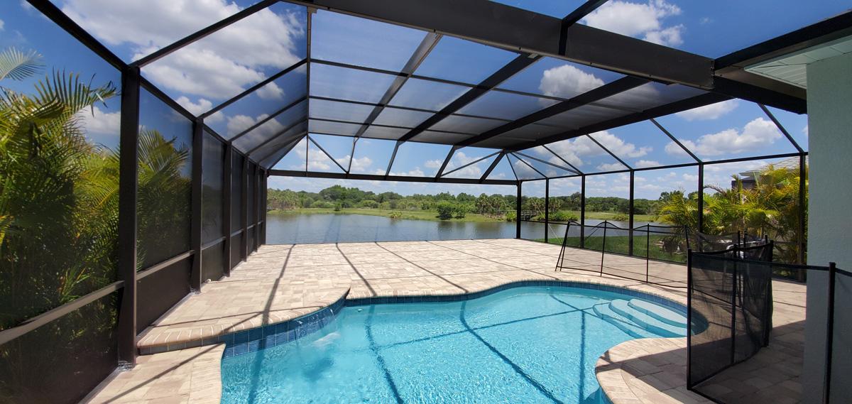 Enhancing Your Outdoor Space with a Mansard Roof Pool Cage