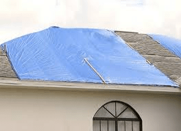 How To Cover Tarp On The Roof Of A House