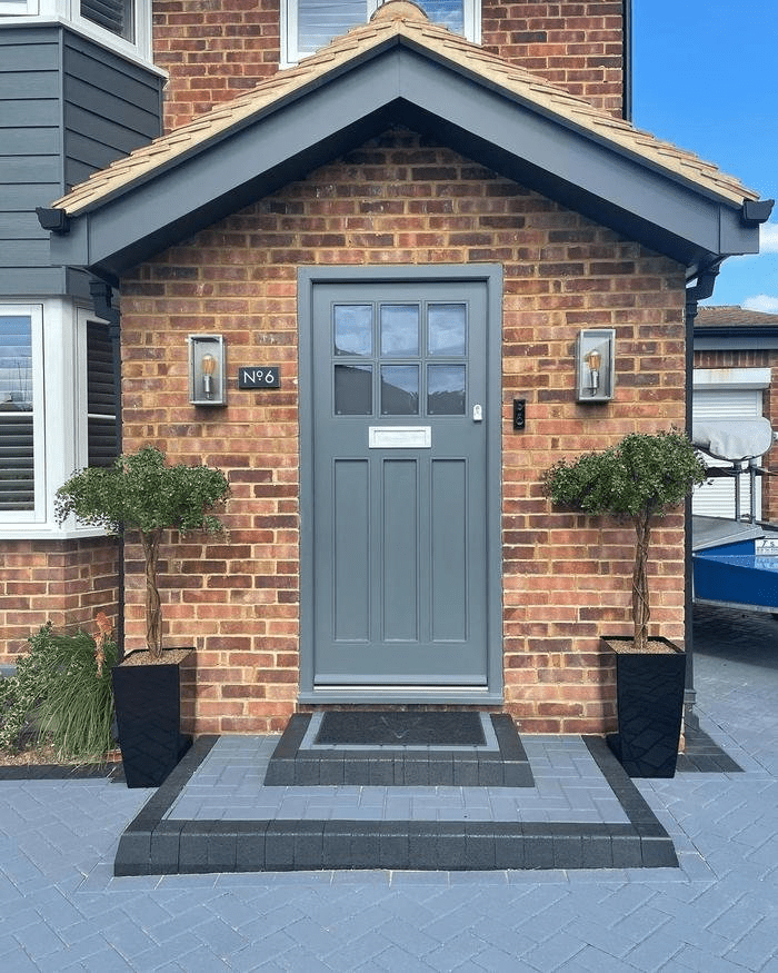 Added Front Porch On Front Of House With Detached Roof