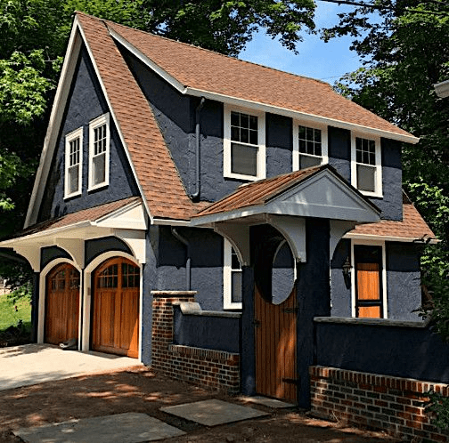 Blue Cedar House With Brown and Red Tone Shingle Roof: A Perfect Blend of Style and Durability