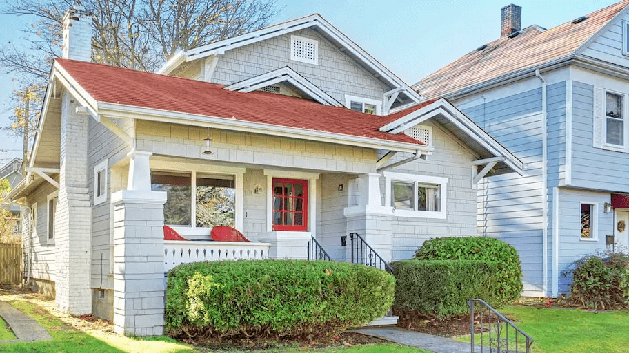 Dark Red Roof Top House With Light Blue And White: A Stunning Color Combination for Your Dream Home