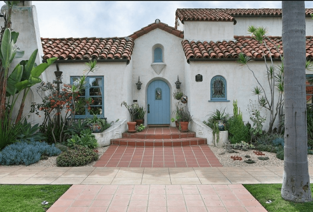 Why a House With Dark Blue Gray Front Door Spanish Tile Roof Is the Perfect Blend of Elegance and Character
