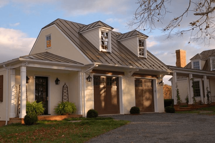House With Metal Roof and 2 Dormers and Car Garage for Style and Functionality: Modern Living Redefined