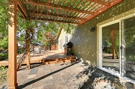 How To Tie In A Flat Patio Roof To House: Step-By-Step Guide
