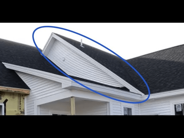 How To Work On House Siding Above An Angled Roofing