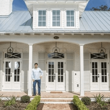 Best Metal Roof Ideas for a Brick House With White Doors and Windows