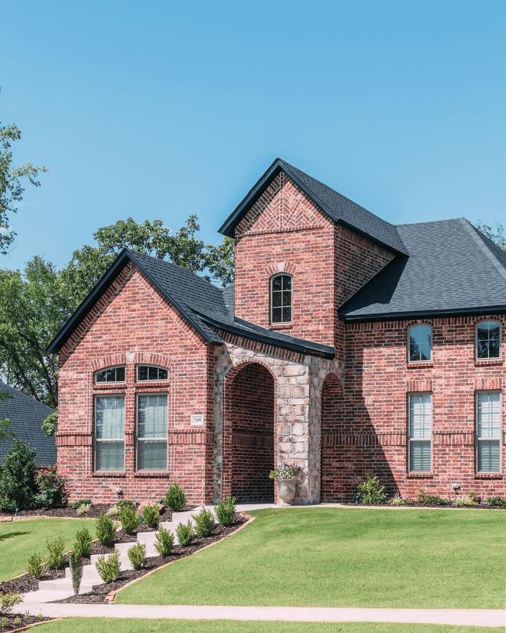 Red Brick House With Siding Colors That Go Black Roof