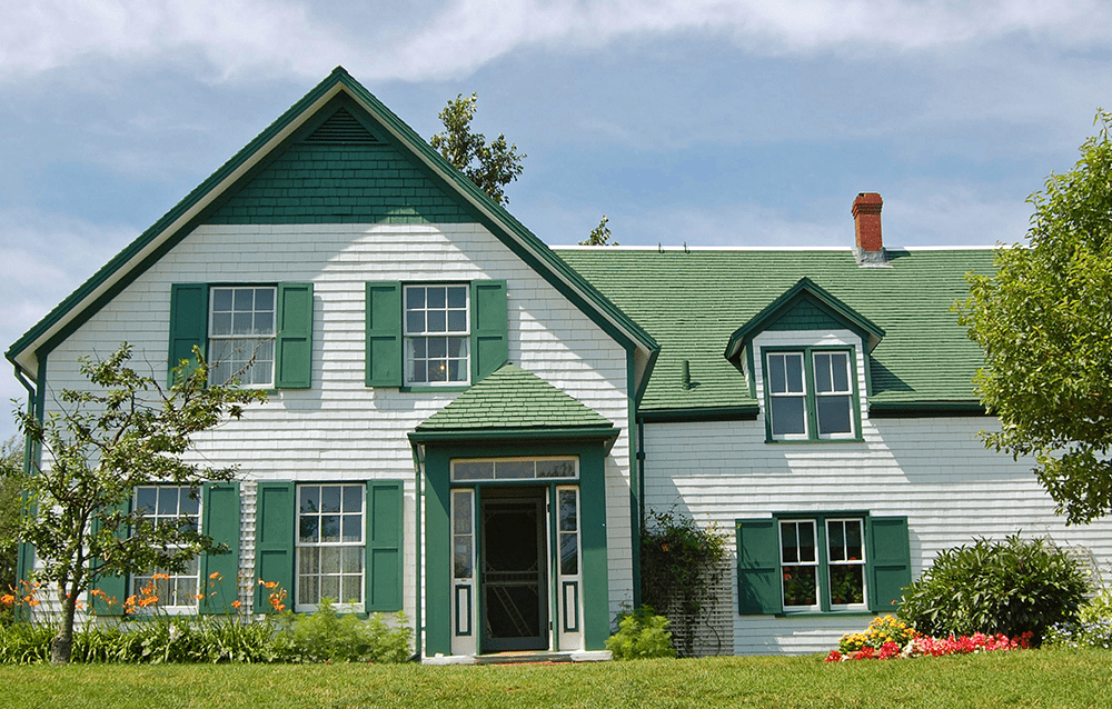 Shutter And Door Colors On White House With Green Roof