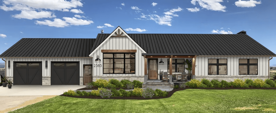 Slate White House With Grey Trim And A Black Roof