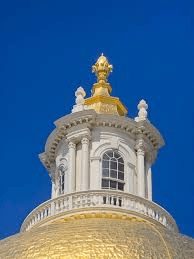 State House Golden Pine Cone On The Top Of Roof: History & Meaning