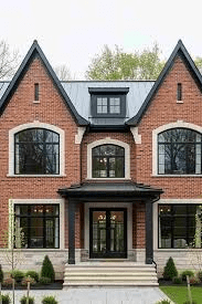 What Color Partial Metal Roof With Brick House Black Shingles