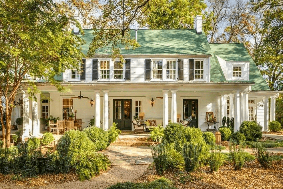 White House With Green Shutters And Green Roof Front Door