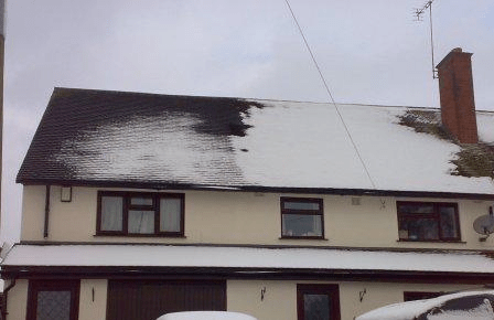 Why Would One House Have No Snow On Its Roof?