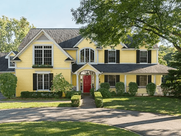 Yellow House Black Roof: What Color To Paint The Deck for Maximum Curb Appeal